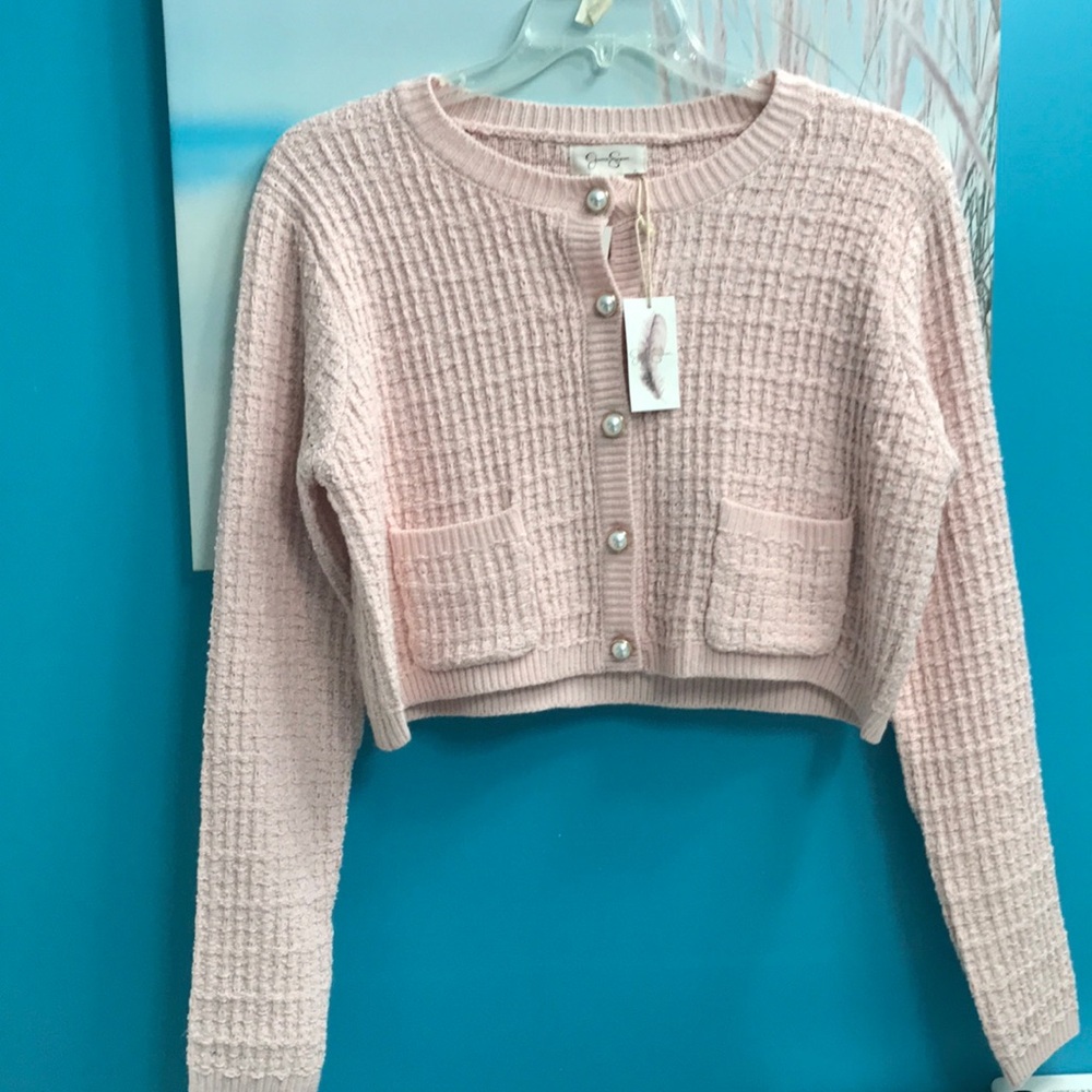 Beautiful formal Jessica Simpson peach/pink sweater with the pearl buttons.
